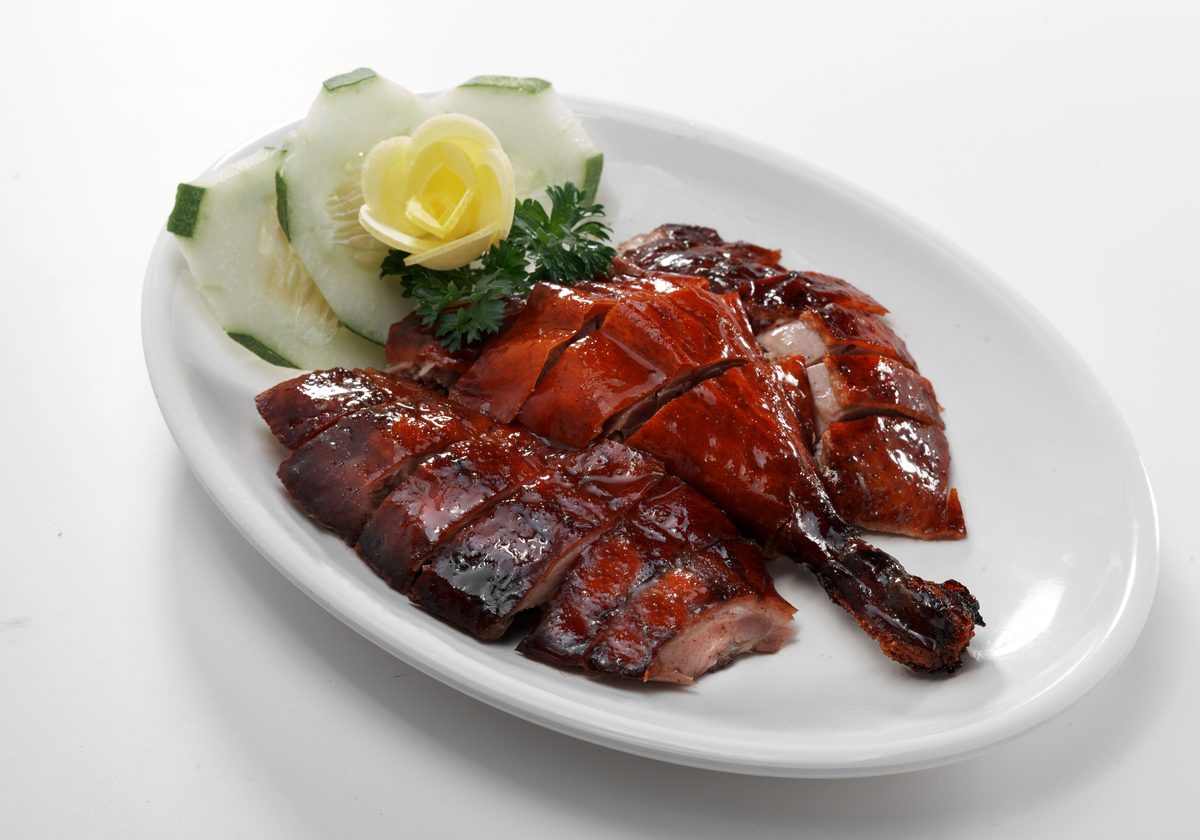 Chopped Hong Kong roast duck on a white platter